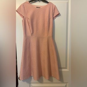 pink dress detailing on front and back last picture shows true color, worn once!